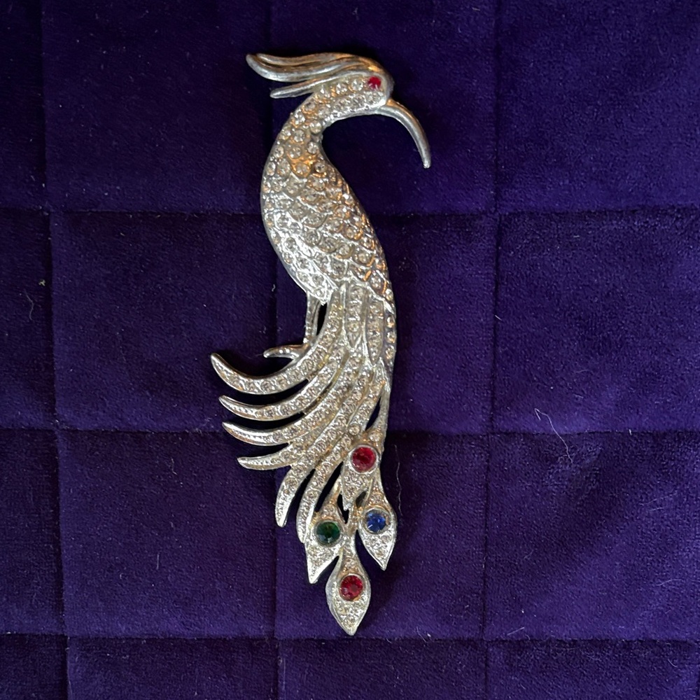 Silver peacock bird brooch with clear rhinestones and multicolored gems